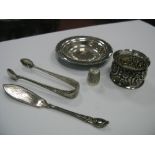 A Hallmarked Silver Napkin Ring, allover decorated in relief, a pin dish, thimble, pair of sugar