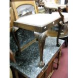 A 1920's Mahogany Stool, with carved knees to cabriole legs, on ball and claw feet.