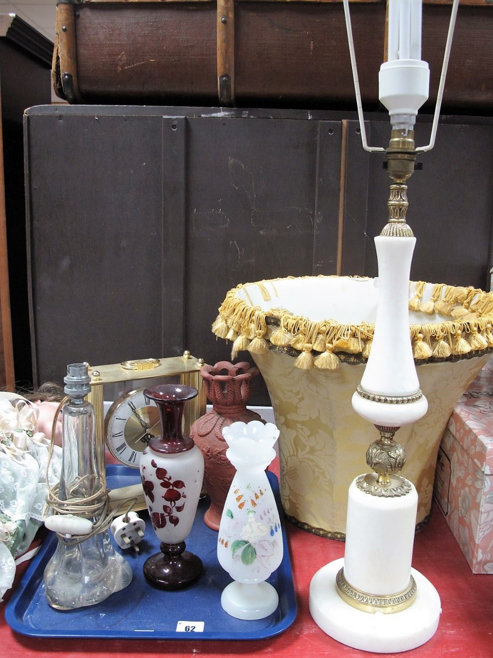 A Strathearn Clear Glass Table Lamp Base, an onyx and brass table lamp and shade, early XX Century