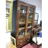 An Oriental Style Display Cabinet, with twin glazed doors, brass lock plate with internal shelves,