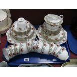 A Clifton China Early XX Century Tea Service of Forty Pieces, with multicoloured swags and gilt