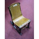 An Early XX Century Miniature Rocking Chair, with a pierced back and seat, with the name 'Pet', on