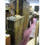 A XX Century Oak Five Piece Bedroom Suite, comprising wardrobe, dressing table, chest of drawers,