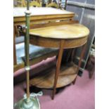 A Mahogany Demi Lune Side Table, with under shelf on tapering legs.