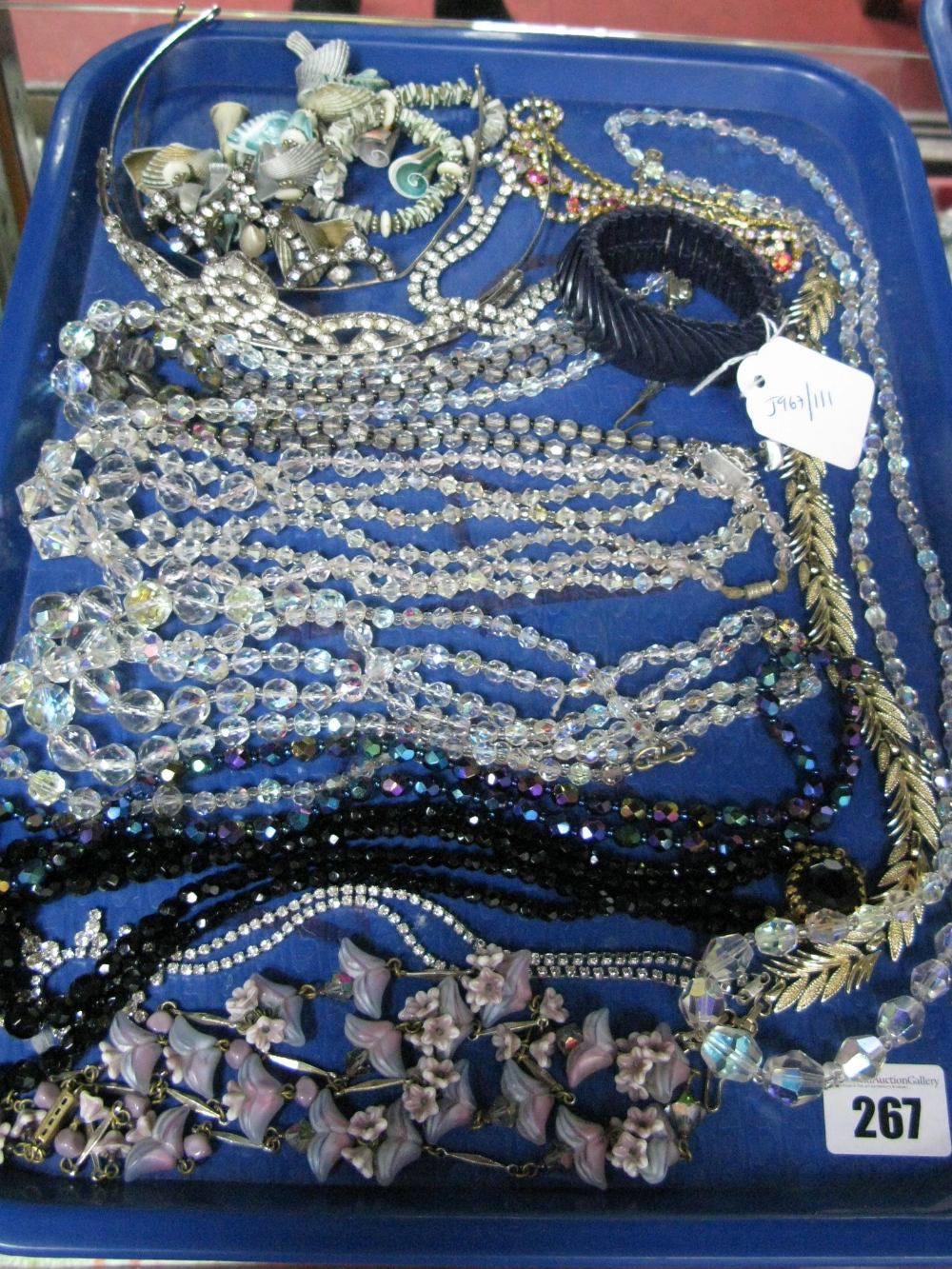 Tiaras, crystal and other bead necklaces, diamanté, bracelet, etc:- One Tray