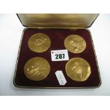 John Pinches Set of Four Bronze Coins Commemorating Winston Churchill, in case.