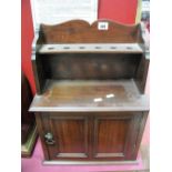Early XX Century Walnut Tobacco Cabinet, shaped back, pipe rack, panelled door.