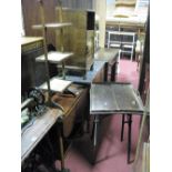 A Mahogany Drop Leaf Two Tier Tea Trolley, a three tier cake stand, and a folding butlers tray and
