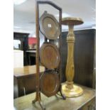 A 1920's Oak Three Tier Folding Cake Stand, together with a pine jardiniere stand with a circular