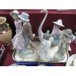 Five Nao Figurines, including courting couple, lamb carrier.