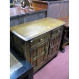 A XX Century Oak Dresser Base, two drawers with knulled decoration over two panelled doors, on stile