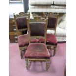 A Set of Six XIX Century Oak Dining Chairs, with oval shield cresting, turned legs, upholstered in a