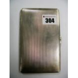 A Hallmarked Silver Cigarette Case, of slim rectangular form, allover engine turned.