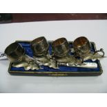 A Set of Four Plated Salts, each as an acorn with loop handle; together with a hallmarked silver and