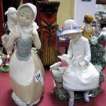 A Nao Model of Seated Girl with Doves, and a Nao girl carrying a sheep on her shoulders. (2)