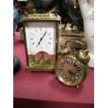 A Brass Cased Schatz 8 Day Mantel Clock, bevelled glass plates, cast spiral twist handle and an