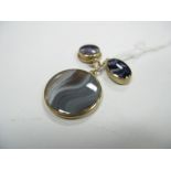 A 9ct Gold Mounted Blue John Pendant, of oval form; together with a smaller circular pendant, and