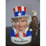 A Royal Doulton "Uncle Sam" Jim Beam Whiskey Advertising Flask, 13.5cm high (empty).