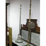 Two Standard Lamps, and fender in brass.