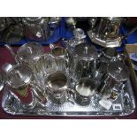 An Old Hall Four Piece Teaset, of planished finish; together with a rectangular tray of similar