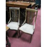 A Set of Four Edwardian Mahogany occasional chairs, bar backs over pierced and foliate carved