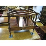 A XIX Century Style Mahogany Canterbury, with turned supports, single drawer, on turned legs.