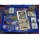 Assorted Costume Brooches, including dress clips, buckles, etc:- One Tray