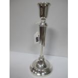 A Hallmarked Silver Candlestick, of plain tapering design, 25.5cm high (base weighted).