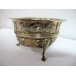 An Embossed Silver Sugar Bowl, featuring swan, dolphin, pig and other animals, with