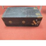 A Travel Trunk, circa 1920's with brass corner mounts and fitted interior.