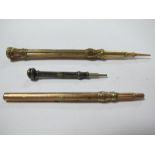 A Sliding Pencil, with hardstone inset end, a miniature hallmarked silver example and another (