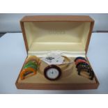 Gucci; A Vintage 1100-L Ladies Wristwatch, with interchangeable bezels, in original box.