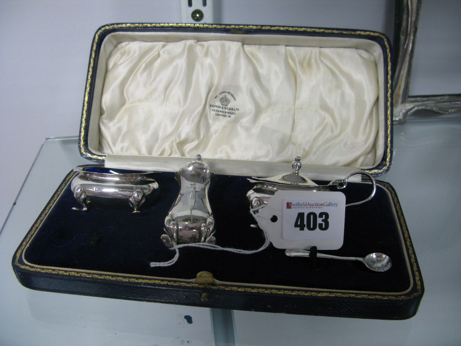 A Hallmarked silver Three Piece Cruet Set, (all marks rubbed) in original fitted box.