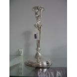 A Hallmarked Silver Candlestick, of plain tapering design, with removable nozzle, 25cm high (base