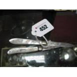 Two Hallmarked Silver and Mother of Pearl Folding Fruit Knives, T.M, Sheffield 1862; J.Y.C,