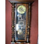 A XIX Century Walnut Cased Viennese Wall Clock, with black Roman numerals to cream dial.