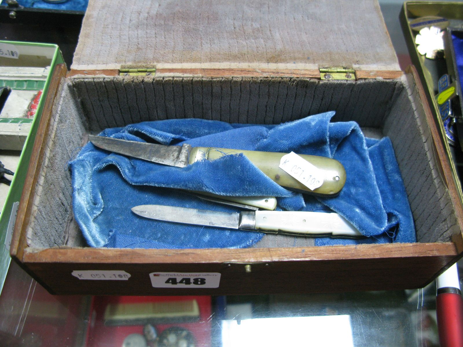 A Hallmarked Silver and Mother of Pearl Folding Fruit Knife; together with a pruning knife and a