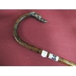 A Late XIX Century Cane, with handle in the form of a whippet's head.