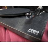 A Rega Planar 2 Turntable, (no information printed on the stylus/cartridge), with two carbon fibre