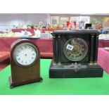 A XIX Century Black Slate Mantel Clock, the dial with gilt Roman numerals within architectural style