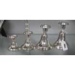 A Set of Four Graduated Candlestick's, each of plain tapering design, stamped marks "925", tallest