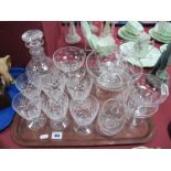 A Stuart Crystal Decanter, six wines and six star cut sundaes, jug, bowl:- One Tray