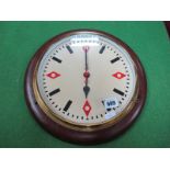 A Circa 1920's GRVI G.P.O Wall Clock, the circular dial with black and red markers, within plain