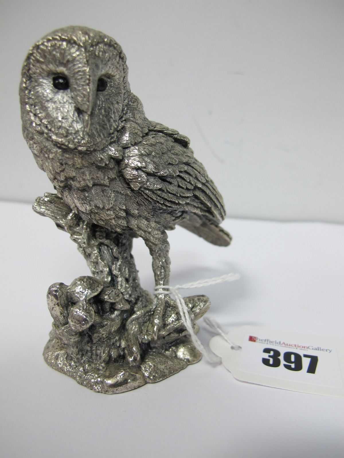 A Hallmarked Silver Filled Model of an Owl, of naturalistic design, 9.6cm high.