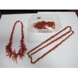 A Graduated Twig Coral Necklace; together with two further coral necklaces.