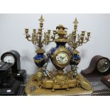 A Reproduction Clock Garniture, in the late XIX Century French fashion, of ovoid form with cast