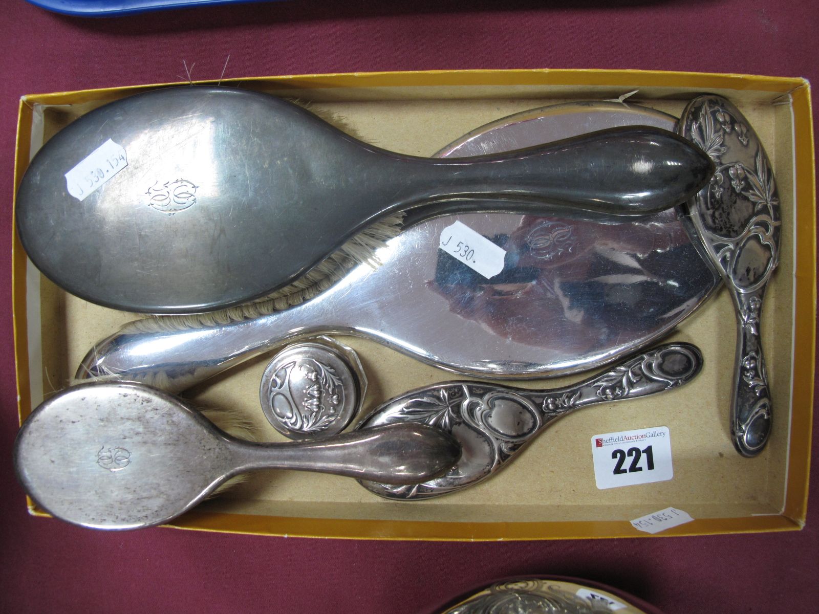 A Hand Mirror and Hairbrush, stamped "916/000", a childs brush, a matching childs hand mirror and