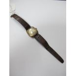 Omega; A Cushion Shape Gent's Wristwatch, the signed (worn) dial with Arabic numerals, baton markers