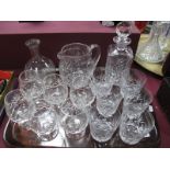 A Stuart Crystal Decanter, six whisky and four brandy glasses, water jug, etc:- One Tray