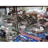 A Pair of Plated Lidded Tureens, each with twin handles; together with a plated three piece teaset